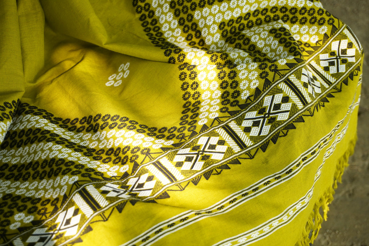 Olive green traditional Mekhela sador