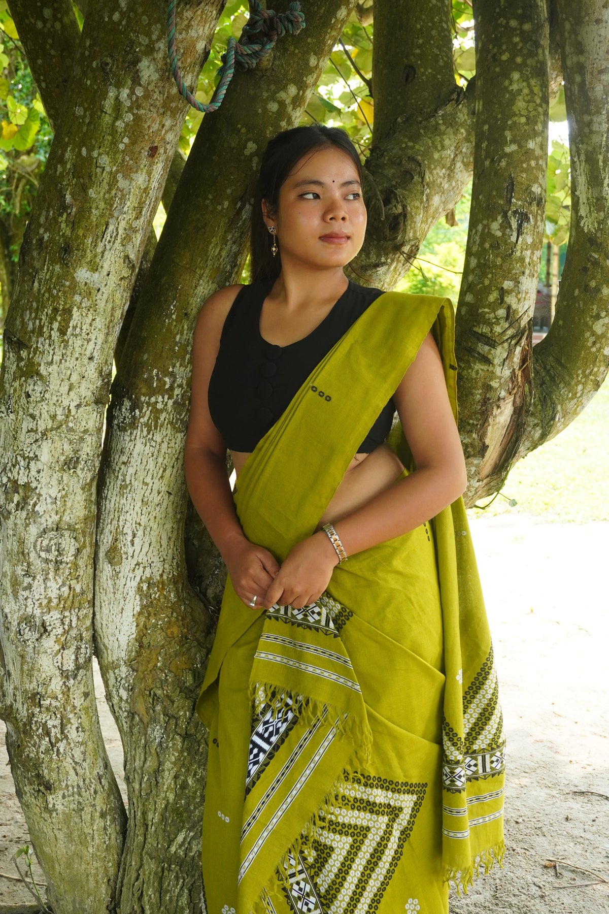 Olive green traditional Mekhela sador